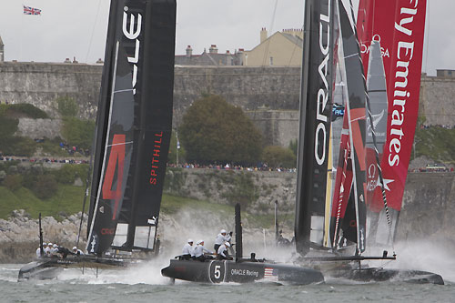 Russell Coutts' and James Spithill's ORACLE Racing AC45 wing-sailed catamarans just ahead of Dean Barker's Emirates Team New Zealand at the America's Cup World Series, Plymouth, UK, September 10-18, 2011. Photo copyright Morris Adant.