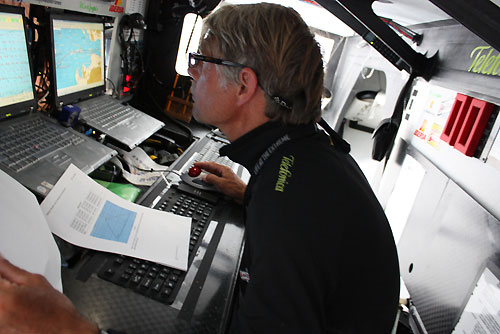 Roger Nilson navigating below on Telefonica Black, during leg 10 from Stockholm to St Petersburg. Photo copyright Anton Paz Telefonica Black / Volvo Ocean Race.