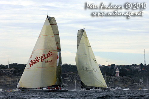 Bob Oatley's 100 footer Wild Oats XI under spinnaker as with Sean Langman and Anthony Bell's Investec Loyal, both off south Hras and making way to the seaward mark after the start of the 2010 Rolex Sydney Hobart Yacht Race. Photo copyright Peter Andrews, Outimage Australia.