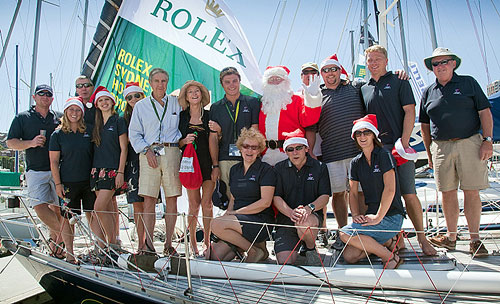 Santa visiting Bill and William Hubbard's Baltic 46 Dawn Star at the docks of the Cruising Yacht Club of Australia. Photo copyright Daniel Forster, Rolex.