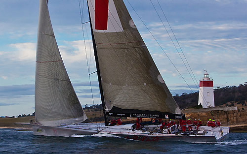 Wild Oats XI skippered by Mark Richards, at the Iron Pot lighthouse which marks the entrance of the Derwent River, during the Rolex Sydney Hobart 2010. Photo copyright Rolex and Carlo Borlenghi.